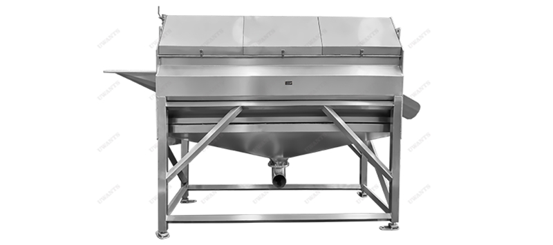 Dual motor driven abrasive peeling machine